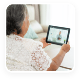 Telehealth patient interactive with a mobile wound care specialist on a tablet.